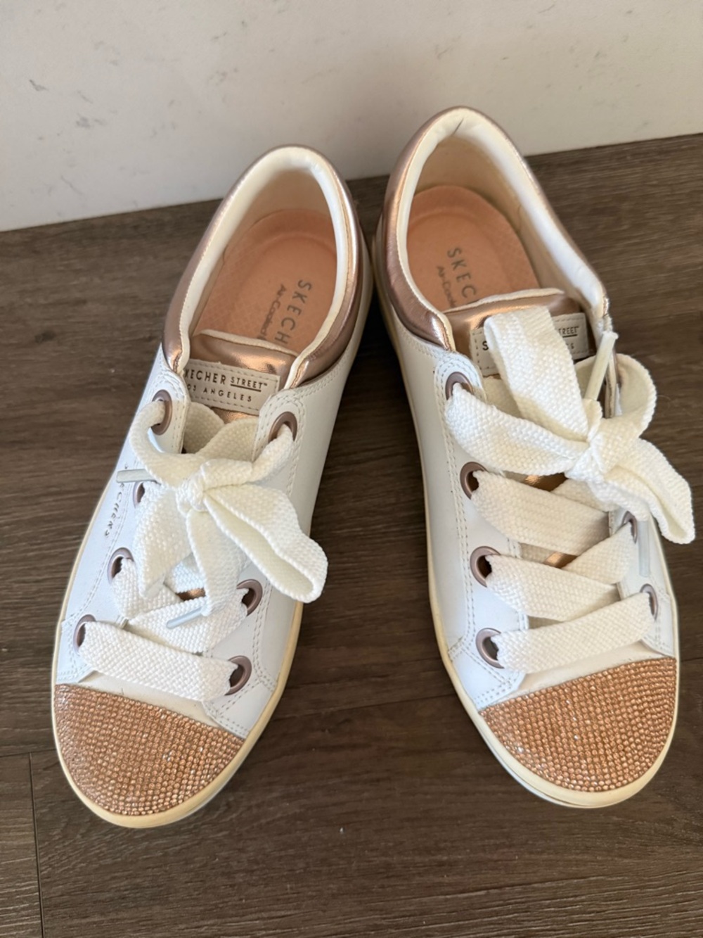 Skechers White Sneakers with Rose Gold Rhinestone Toecap